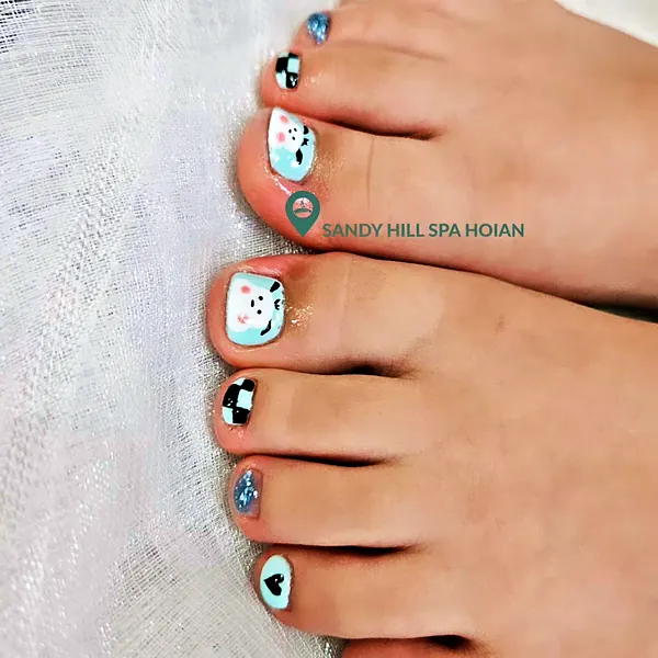 Bunny and checkerboard pedicure art by Sandy Hill Spa