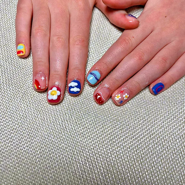 Colourful flower and cloud nail art by Sandy Hill Spa