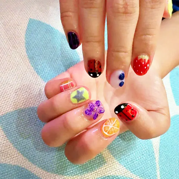 Ladybug, fruit and flower nail art by Sandy Hill Spa