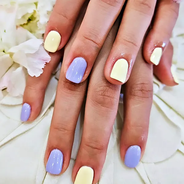 Lavender and lemon two-tone gel nails by Sandy Hill Spa