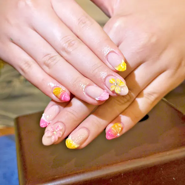 Pink and orange flower tip nails by Sandy Hill Spa