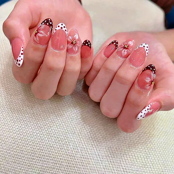 Polka dot French tips with small flowers by Sandy Hill Spa
