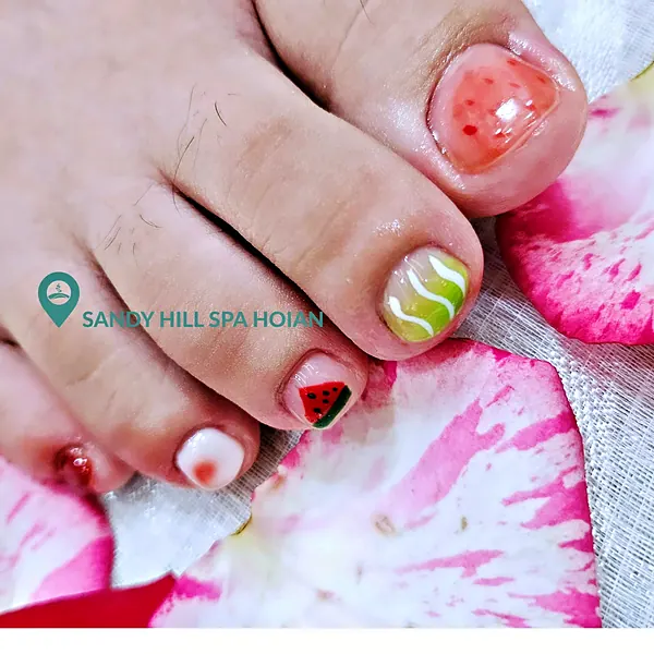 Strawberry and watermelon pedicure art by Sandy Hill Spa