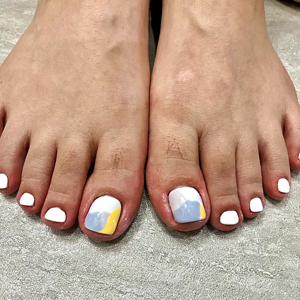 White pedicure with colour accent toes by Sandy Hill Spa